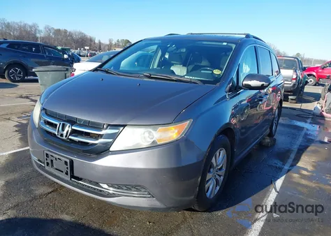 2014 Honda Odyssey Ex-L z USA, uszkodzony, nr VIN 5FNRL5H68EB013396